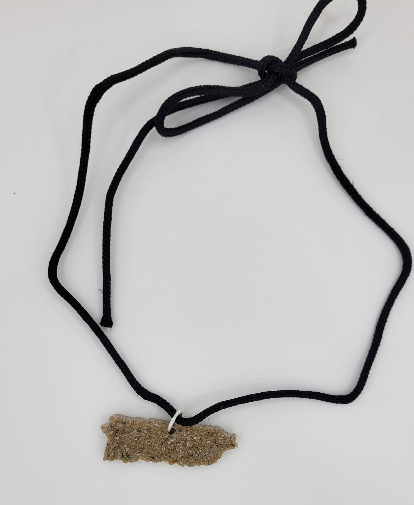 Collar de mapita de arena