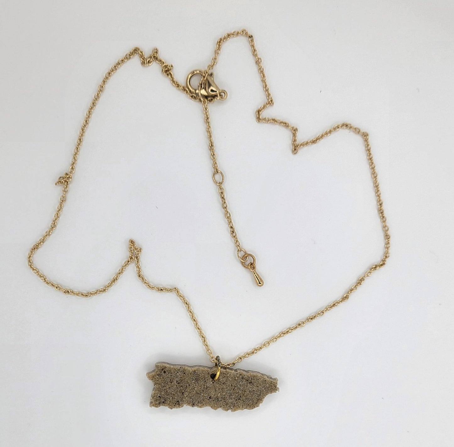 Collar de mapita de arena