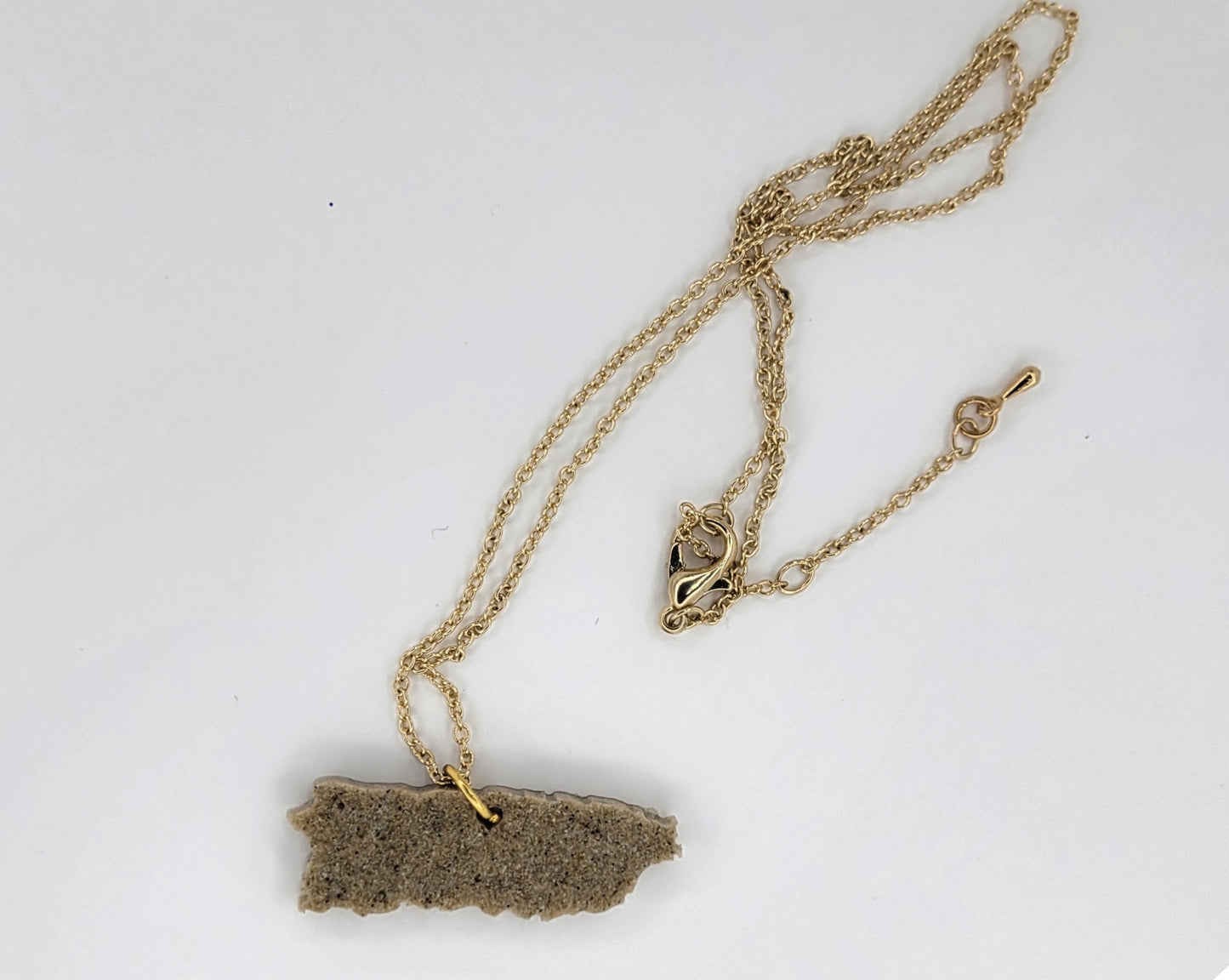 Collar de mapita de arena