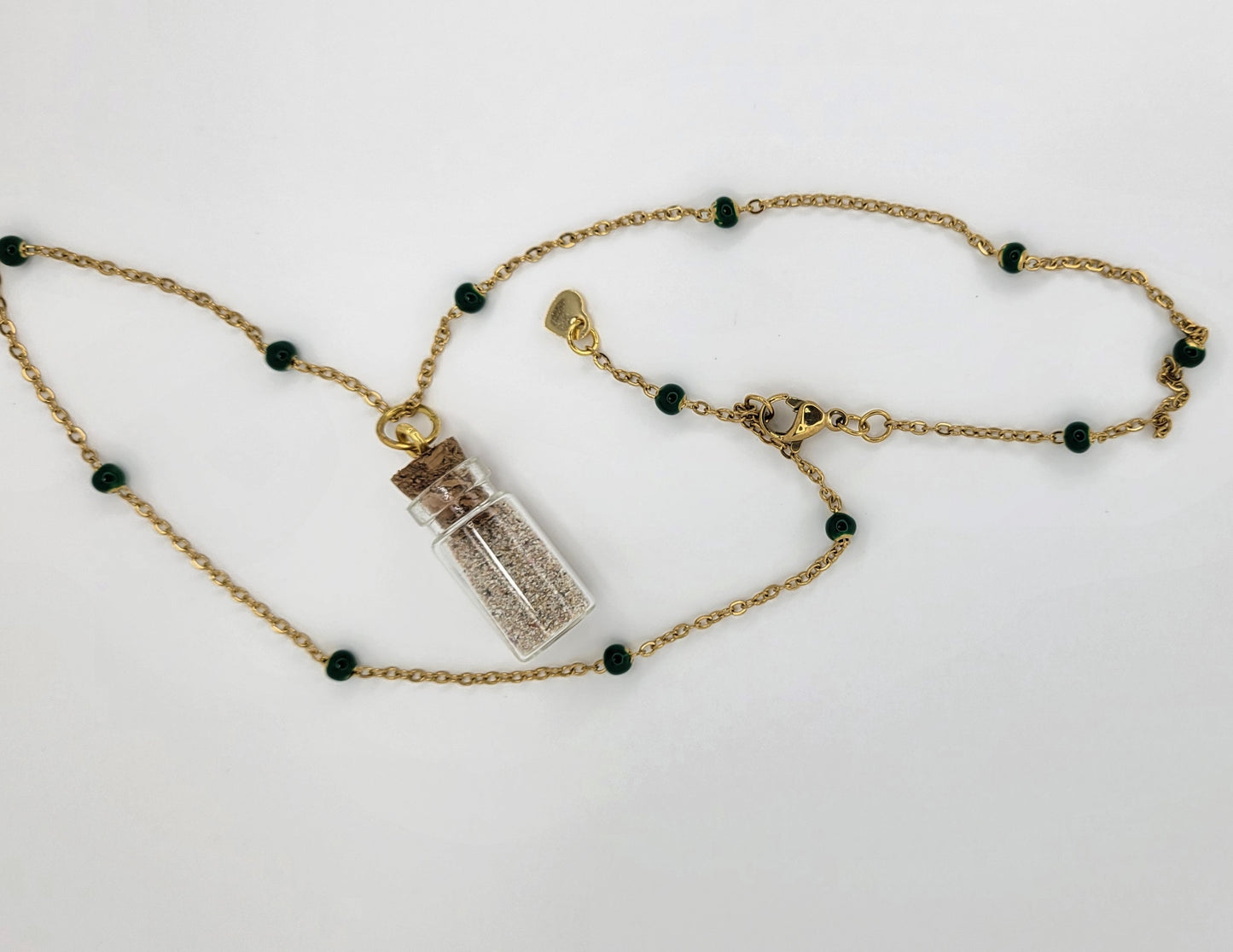 Collar de botellita con arena